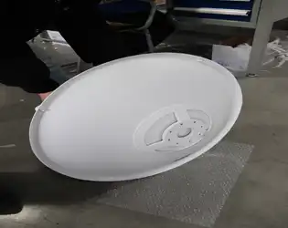 How to select a feed system when designing a parabolic antenna?